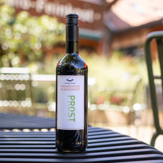 Fischerhuder Flaschenpost rot mit Etikett "Prost"